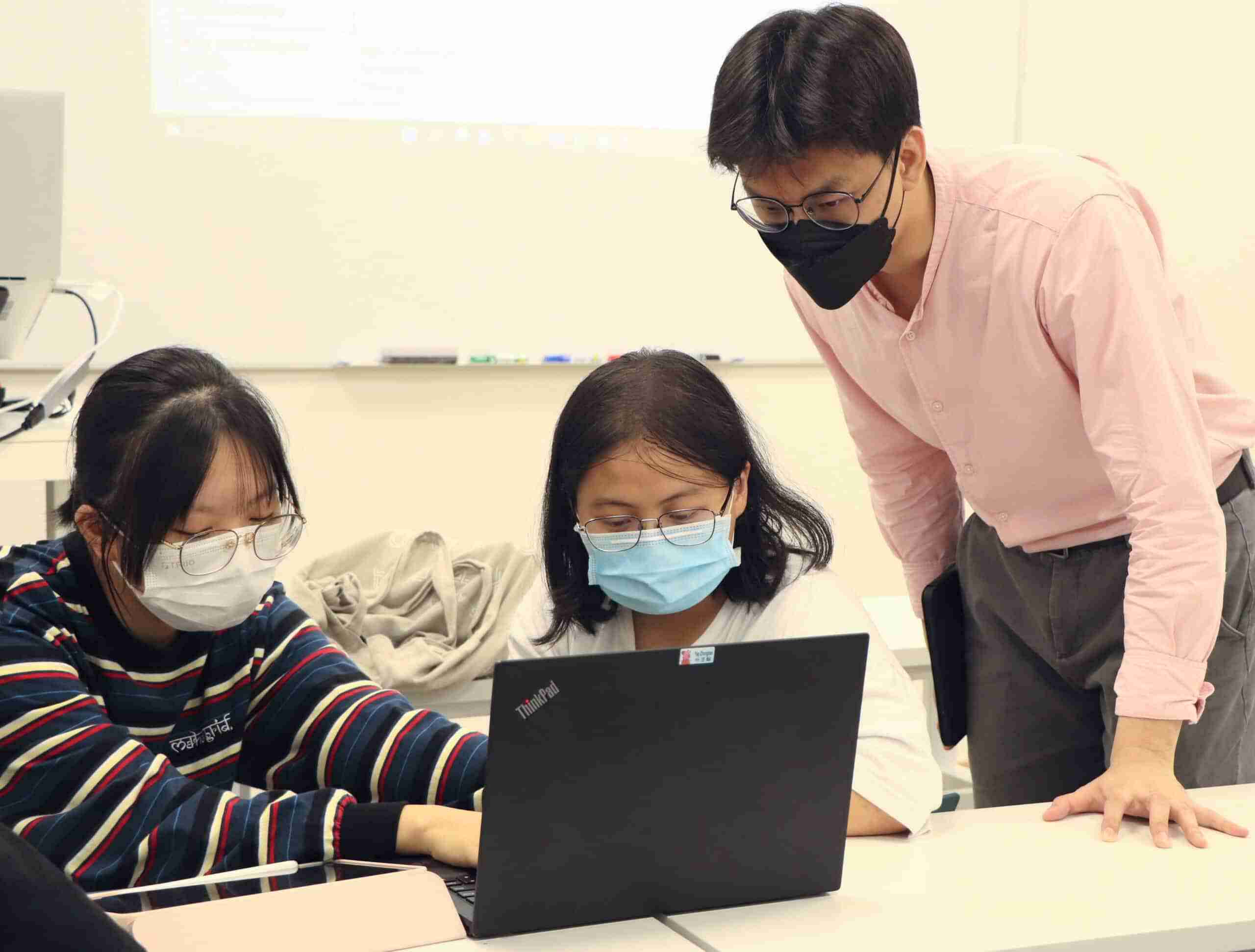 Mr Liew gives close feedback at the Best English tuition centre
