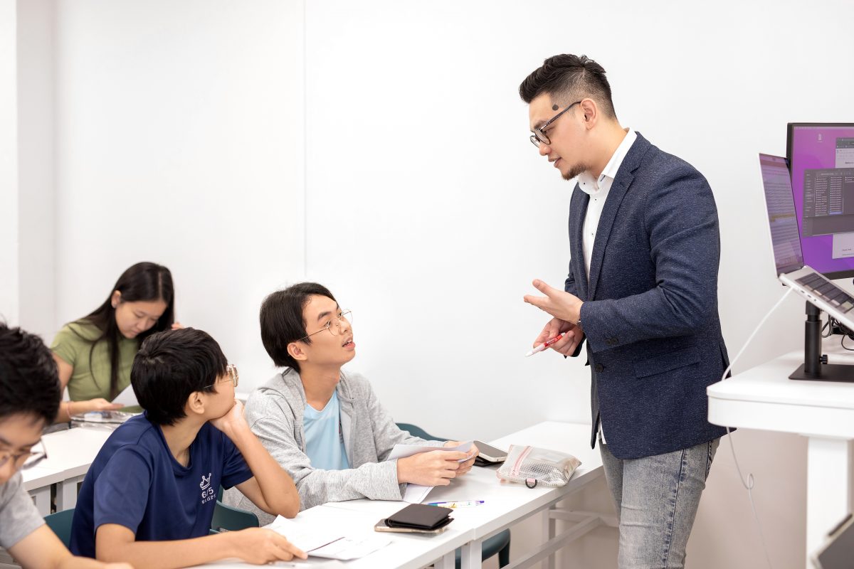students paying attention to their tutor Mr Chia