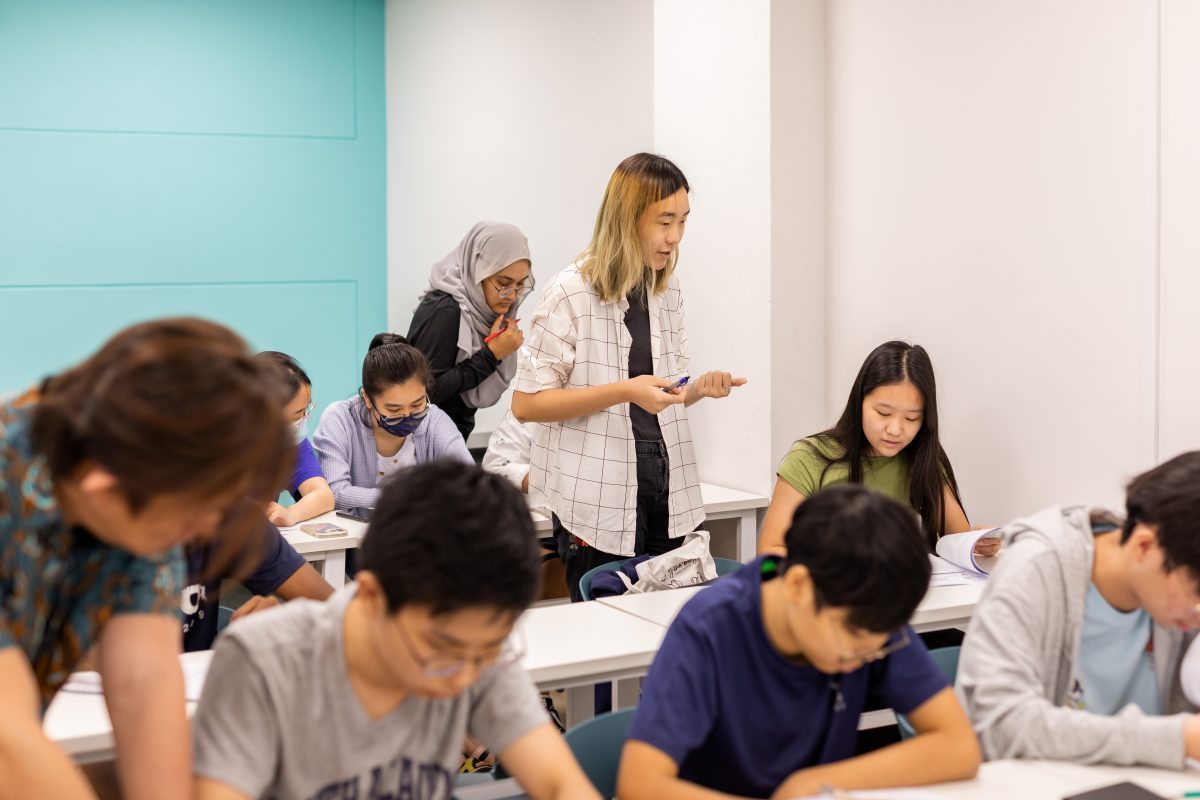 students brainstorming during humanities tuition