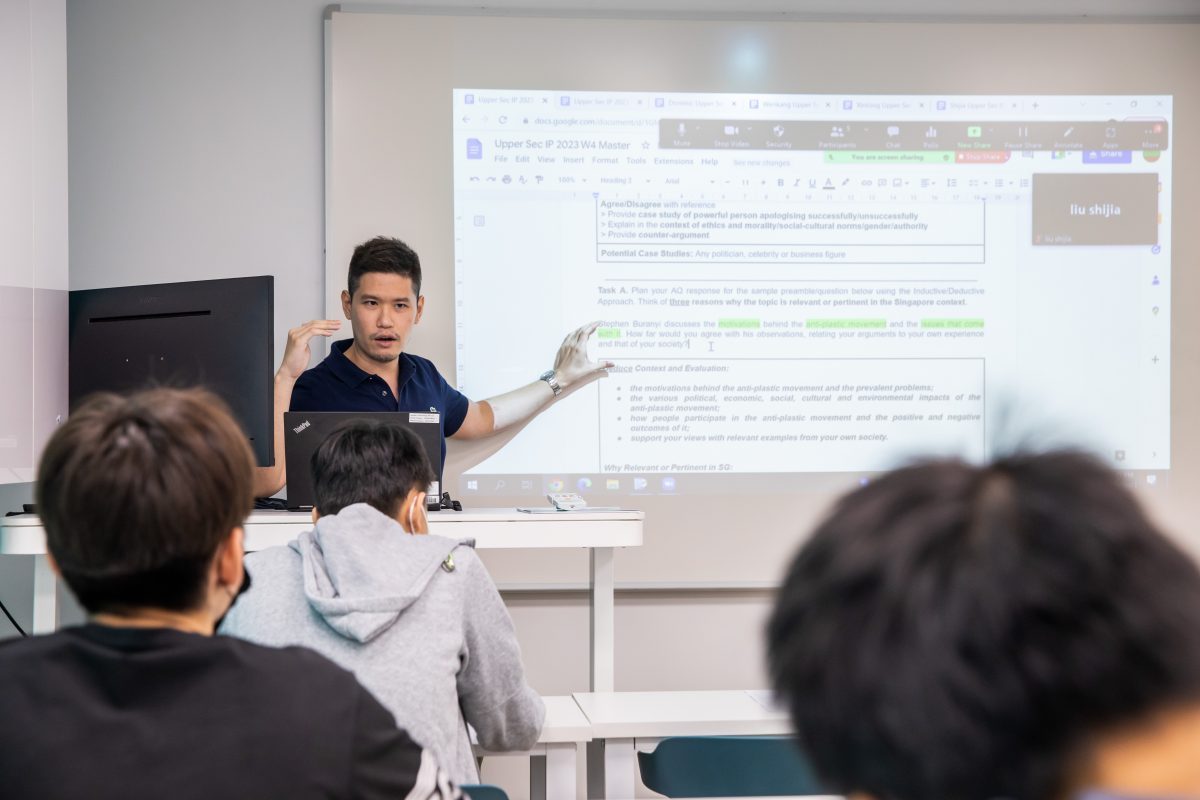 Mr David giving insights to the class during IP English Language Arts Tuition