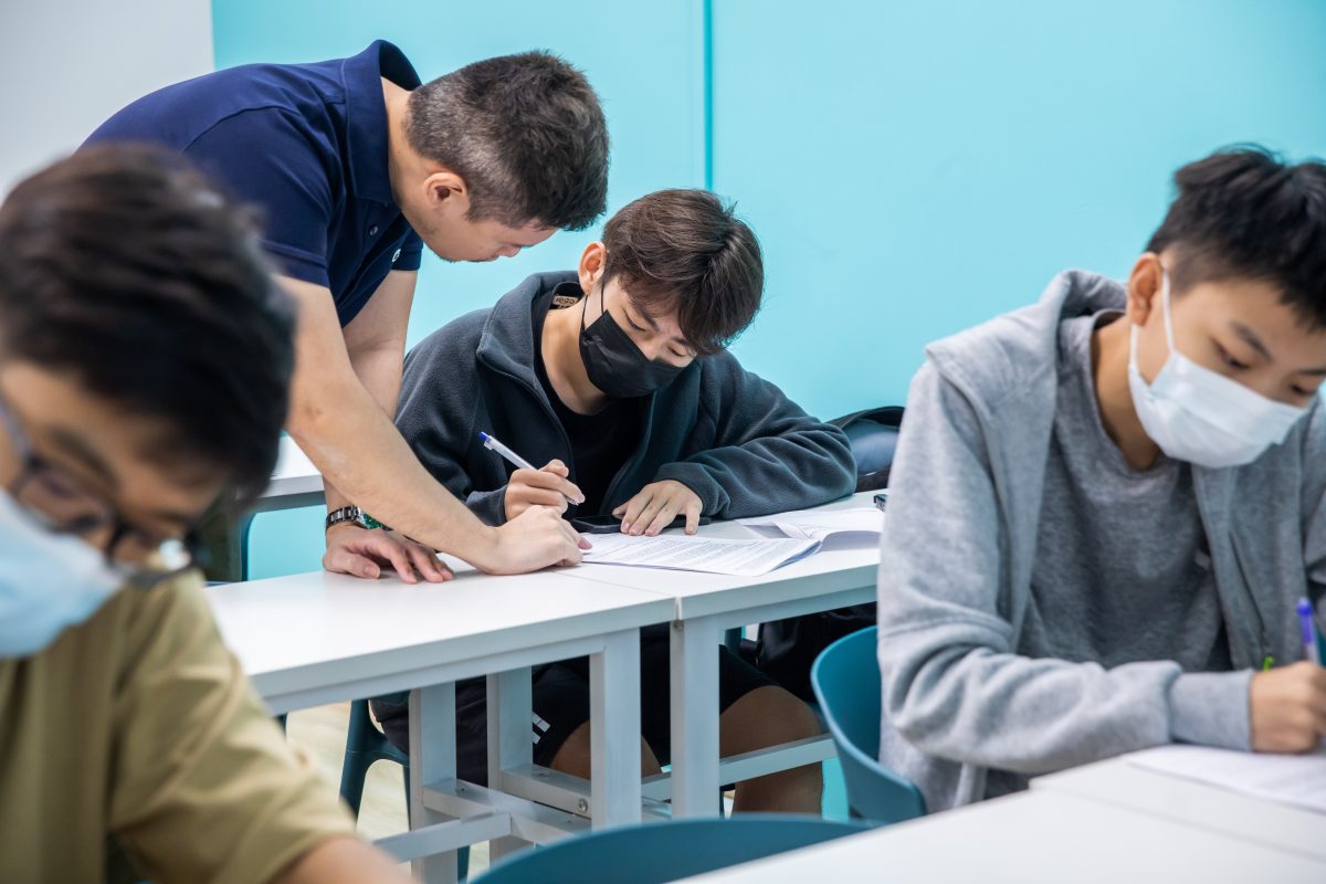 students receive 1-1 guidance during tuition sessions