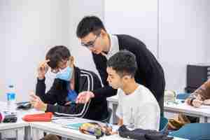 GP tutor Mr Yeo Jia Qi guiding students during a GP tuition lesson