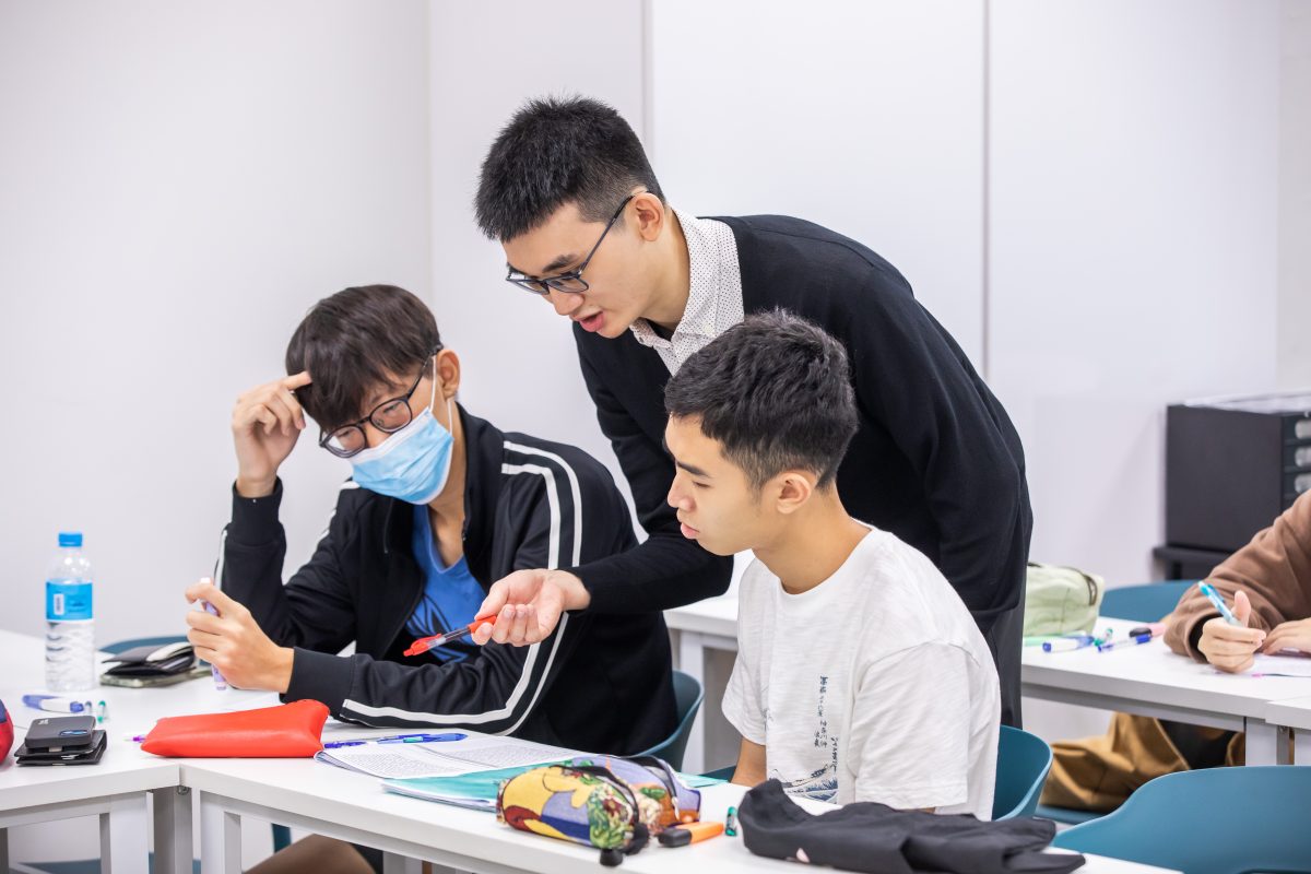GP tutor Mr Yeo Jia Qi guiding students during a GP tuition lesson