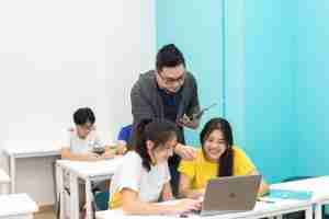 Mr Chia giving students direct feedback during GP tuition classes