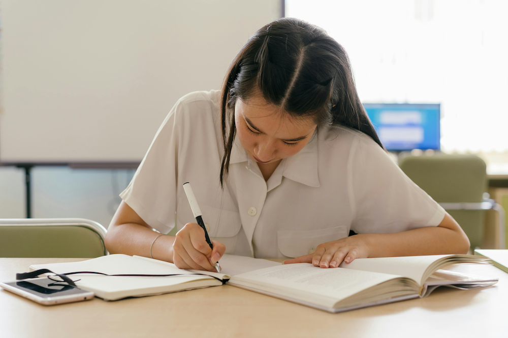 An A-Level private candidate studies for exams.