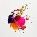 Colorful abstract paint splash on white background, capturing creative expression.